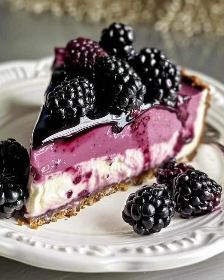 Indulge your sweet tooth with this luscious Blackberry Cheesecake! 