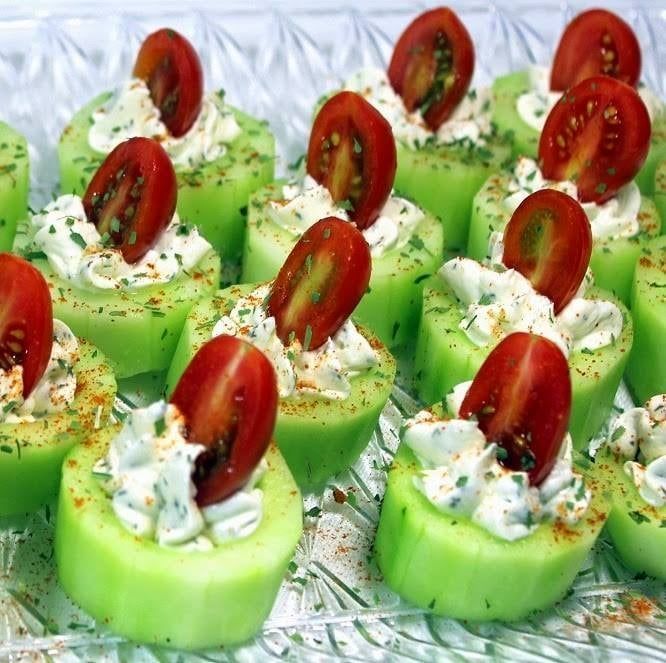 CUCUMBER CANAPÉS WITH HERBED CREAM CHEESE AND CHERRY TOMATOES