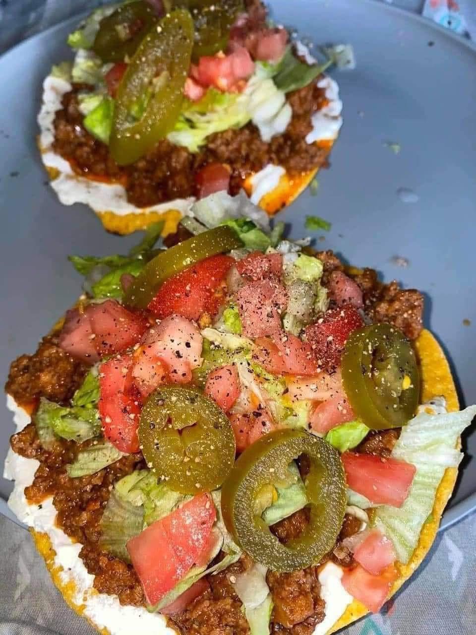 Dinner is served. Refried beans and ground beef Tostadas