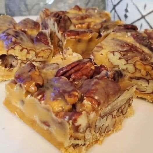 Bars with caramel and pecans.