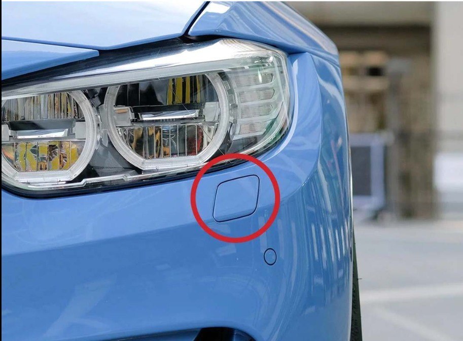 Here’s what the little sign on your car’s front bumper is for