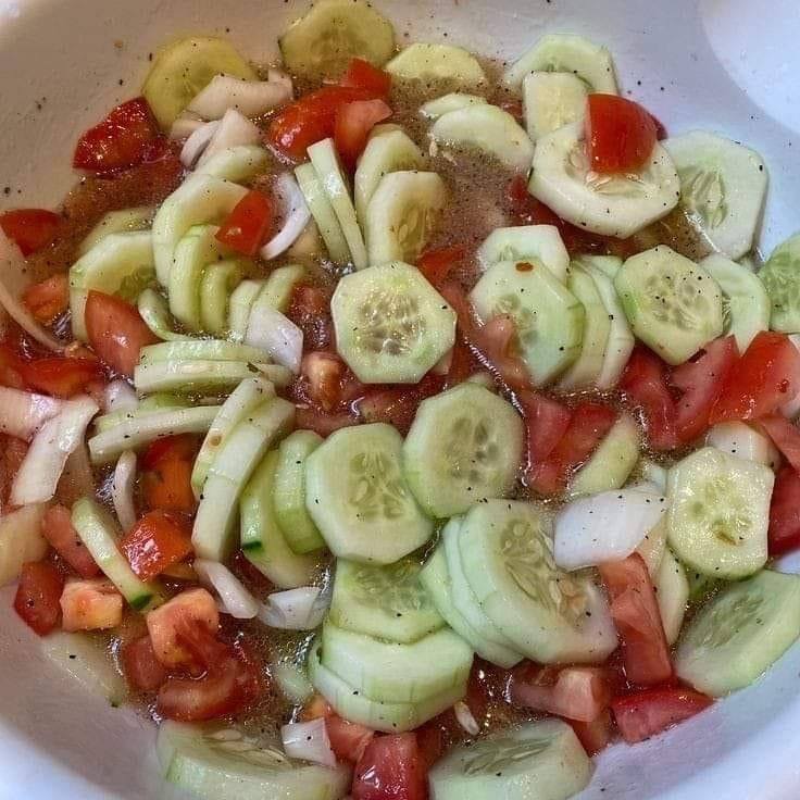 Marinated cucumber, onion and tomato