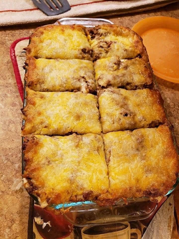 easy casserole recipe is filled with ground beef and loaded with cheese