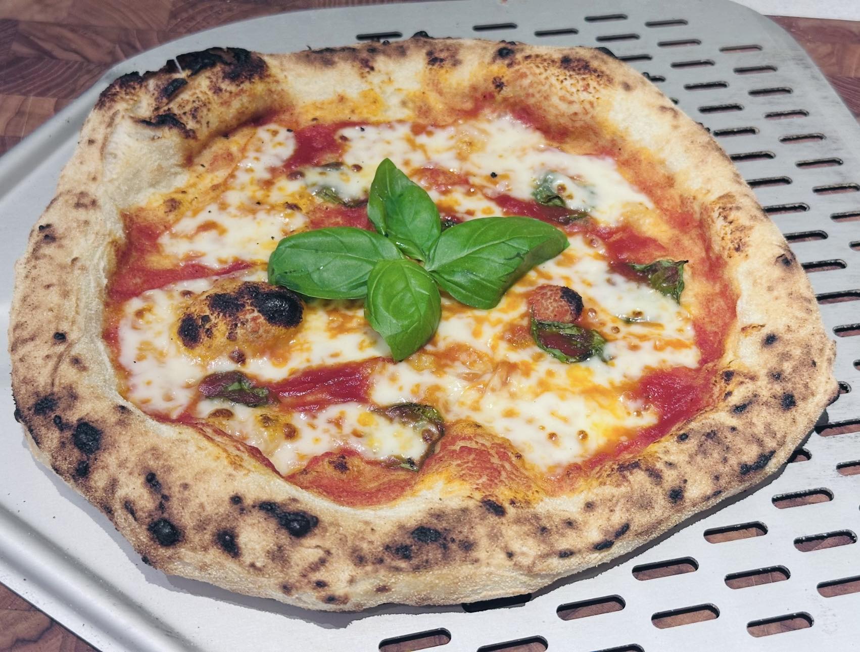 A homemade, simple and delicious pizza margherita 