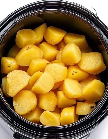 Put raw cubed potatoes in a slow cooker with these 3 ingredients. Your taste buds will thank you.